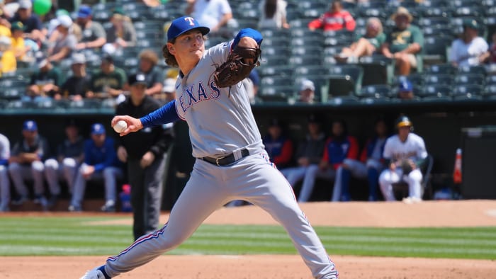 Apr 24, 2022; Oakland, California, USA; Texas Rangers relief pitcher Spencer Howard (31) pitches the ball against the Oakland Athletics during the third inning at RingCentral Coliseum. Mandatory Credit: Kelley L Cox-USA TODAY Sports